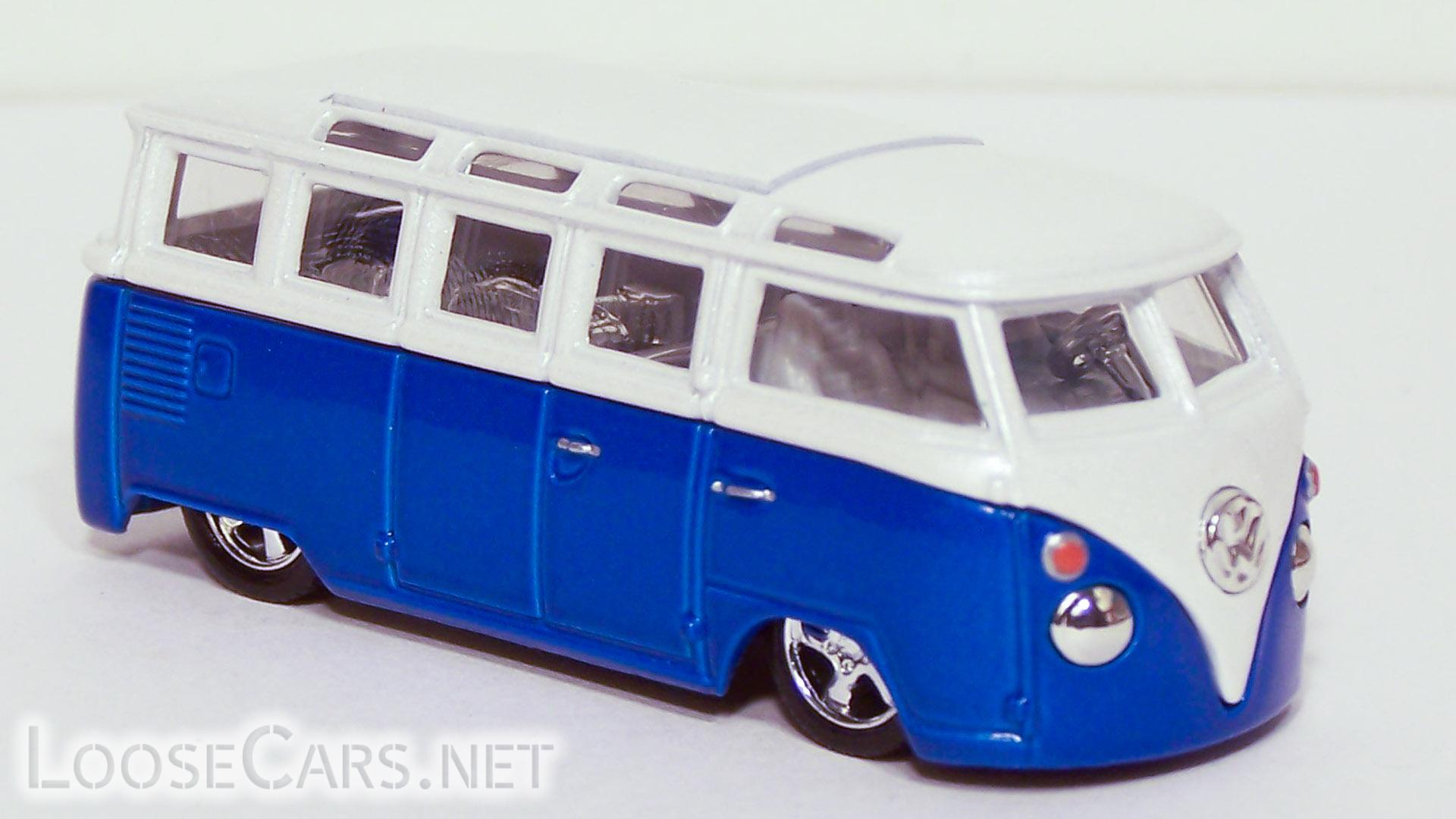 Vintage Volkswagen Microbus: White and Blue Front Right